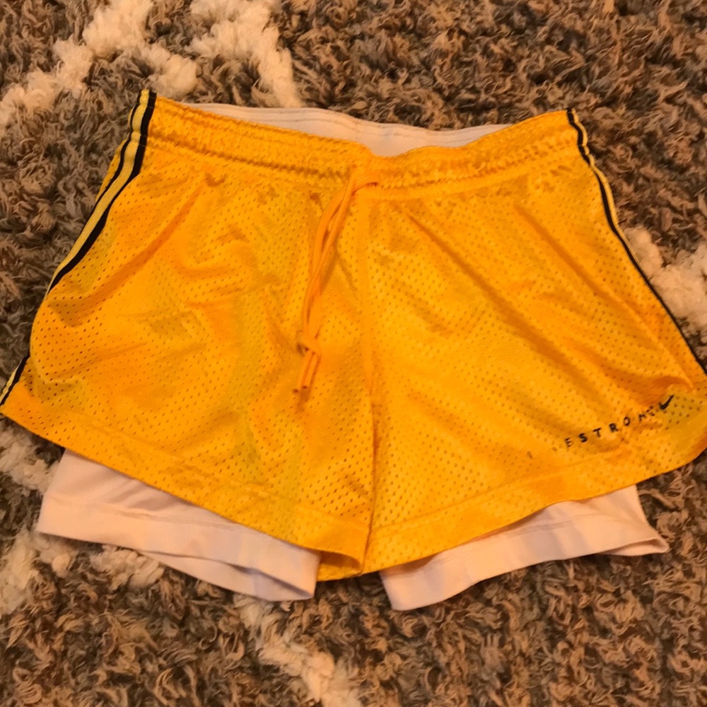 Yellow Nike livestrong running shorts